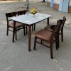 Bộ bàn ăn 4 ghế măngô vân giã đá mới giá xưởng